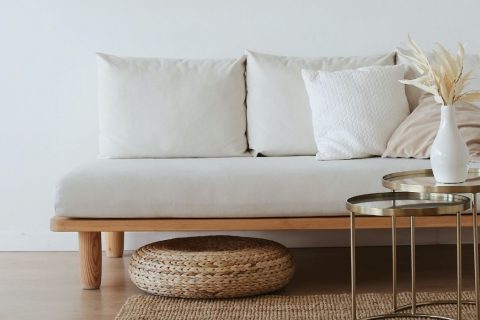 white sofa with vase